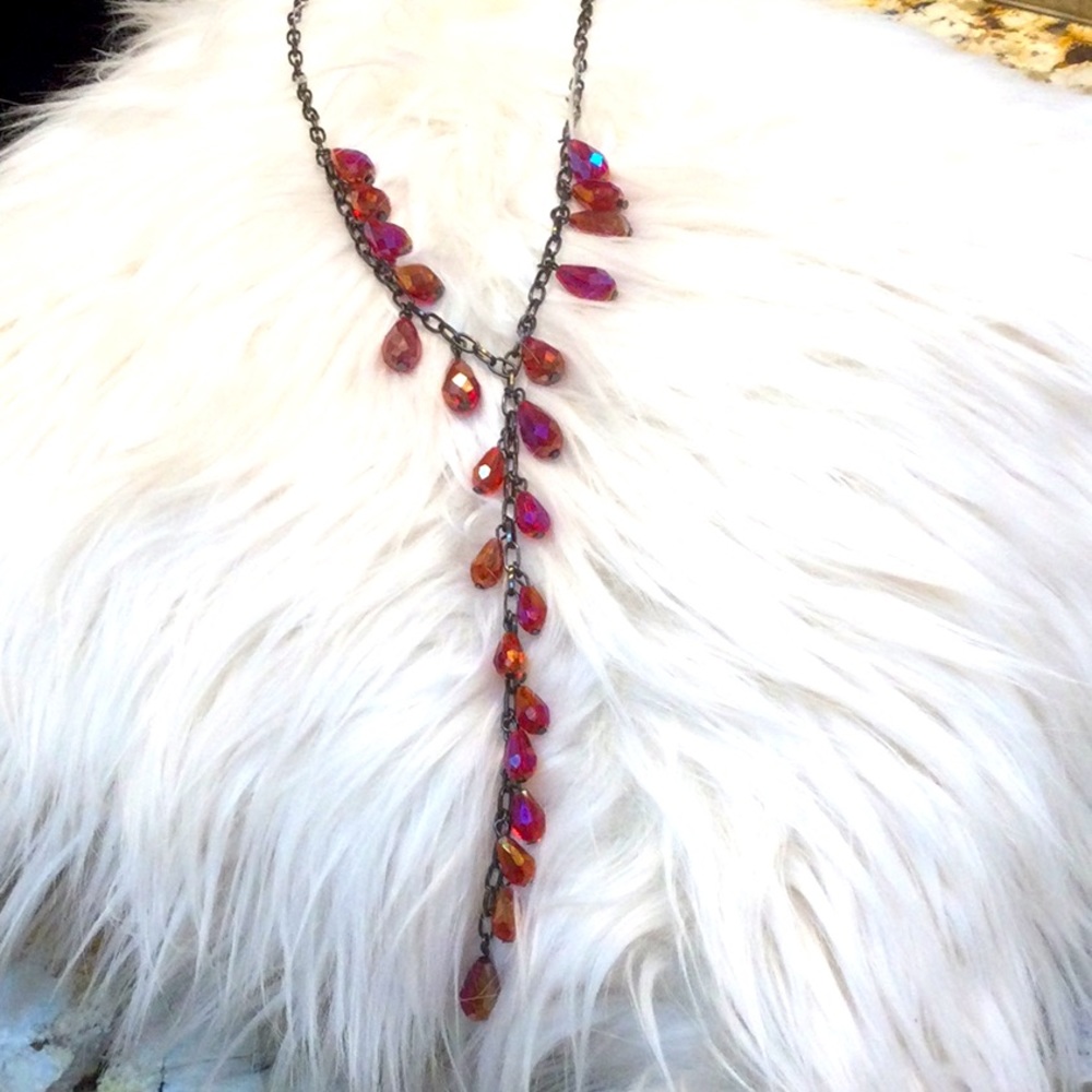 - - Beautiful ruby colored beaded necklace
